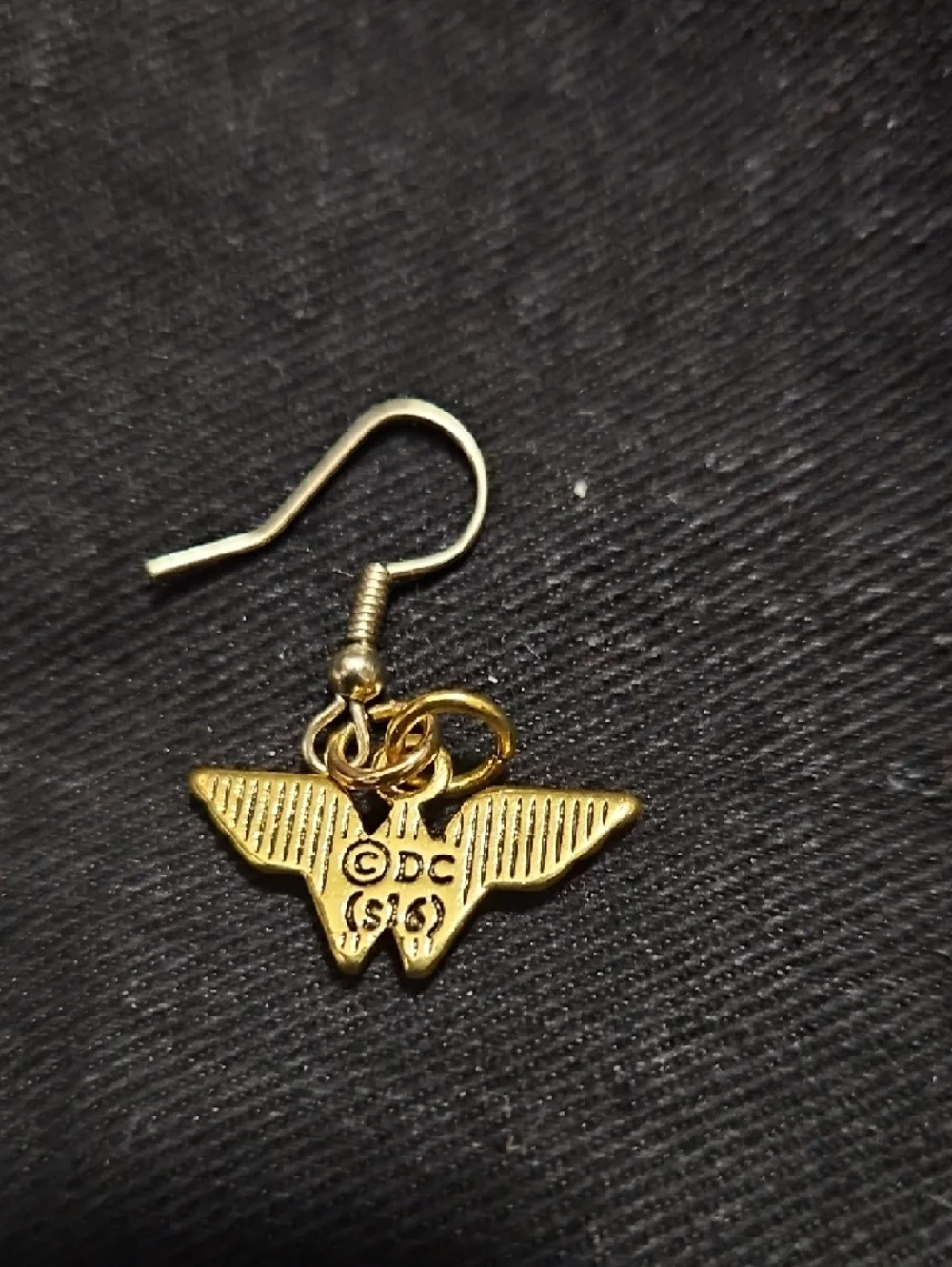 DC Comics Wonder Woman Logo Dangle Earrings Gold Tone